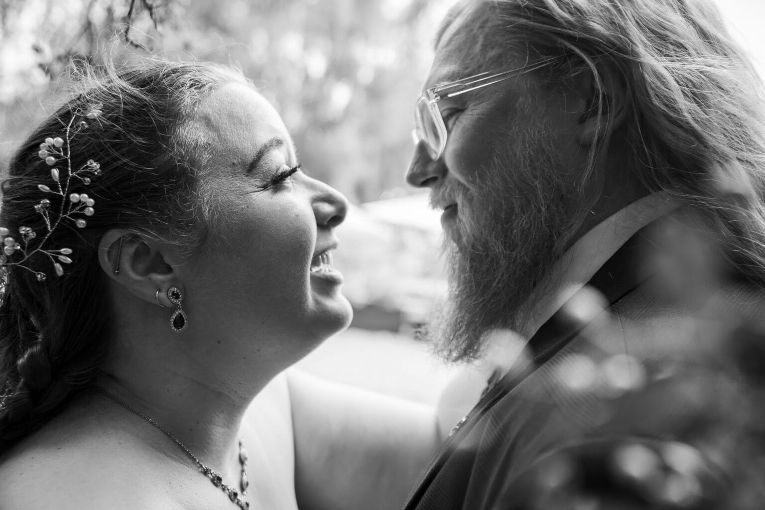 Black and white photo of two people embracing