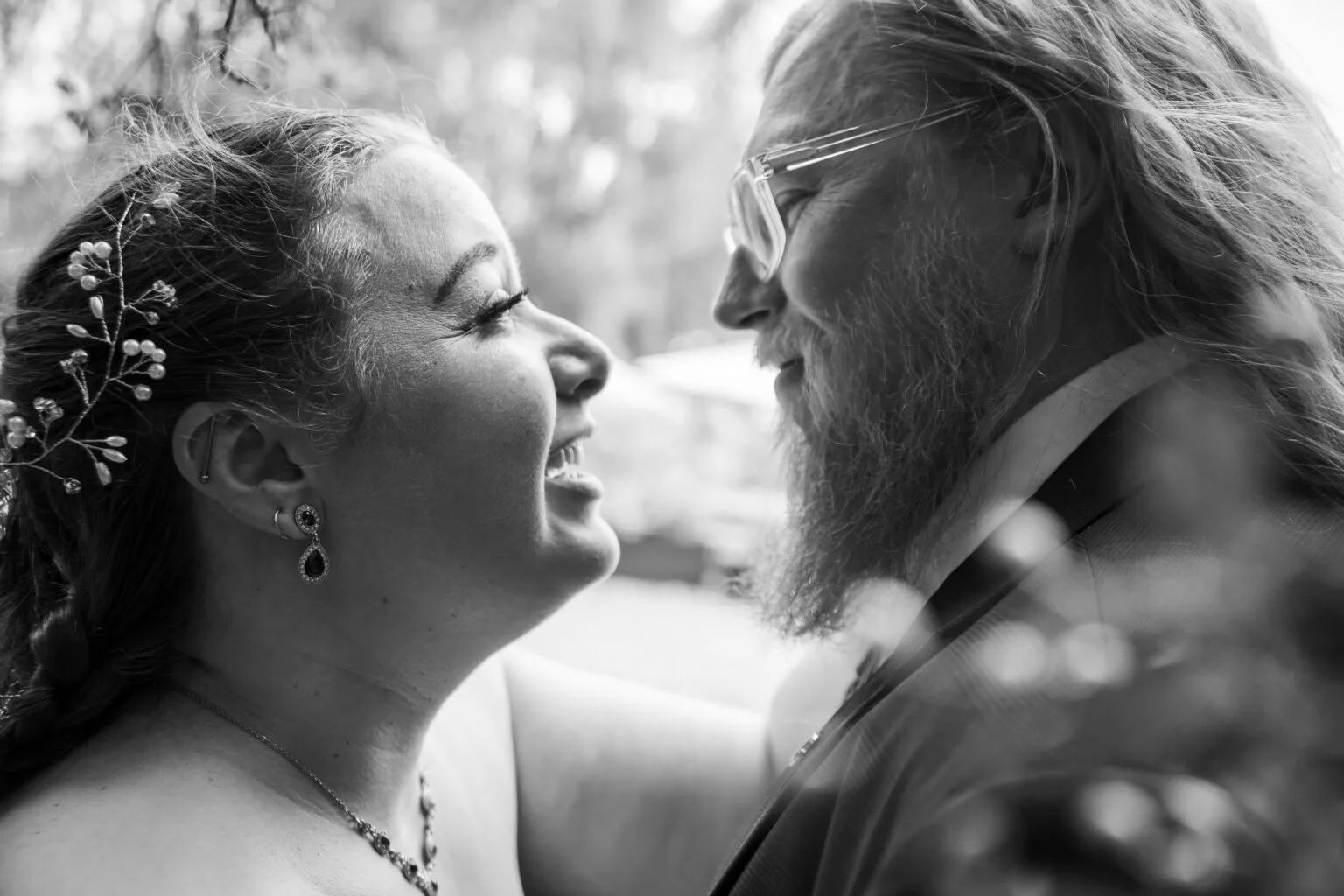 Black and white photo of two people embracing