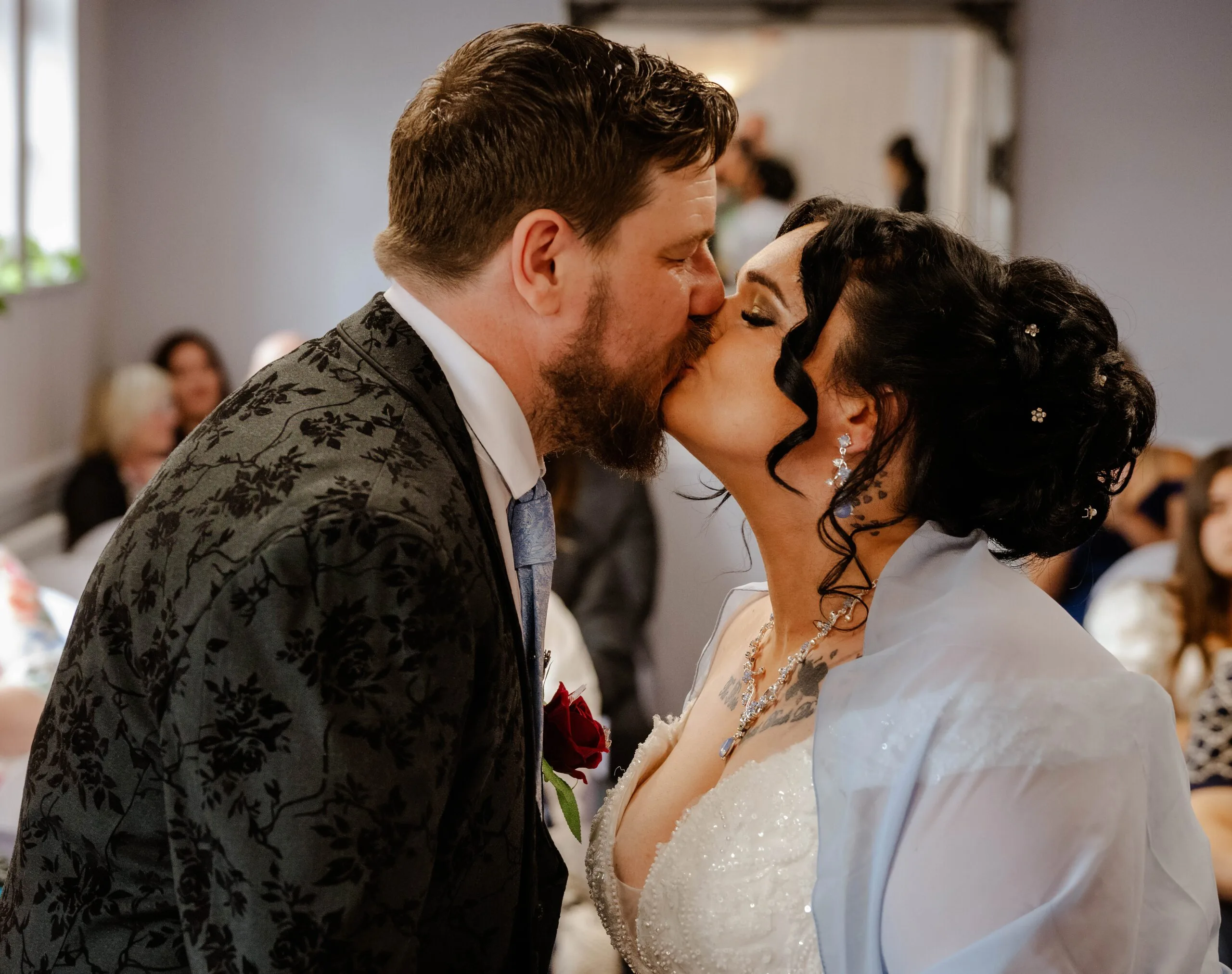 Close-up of a couple kissing during the ceremony